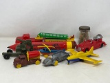 8 Plastic Vehicles- Trucks, Plane and Jar with Papers