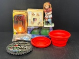 Battery Operated Lamp, Cast Iron Trivet, Collapsible Bowls, Scented Candles, Frame & Girl Figure