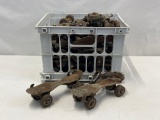 Gray Plastic Crate with Vintage Roller Skates