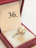 PLATINUM 10.3MM WHITE PEARL AND 0.25CTW DIMOAND RING