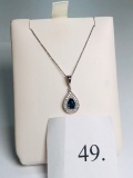 18KT WHITE GOLD 0.50CT SAPHIRE AND 0.15CTW DIAMOND PENDANT WITH CHAIN