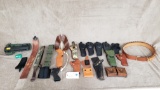 LOT OF GUN HOLSTERS, AMMO POUCHES AND BELTS