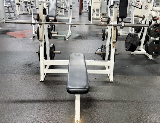 FLEX FITNESS LAYING WEIGHT BENCH WITH BAR AND PLATE WEIGHTS