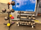 LOT OF KETTLE BELLS AND MEDICINE BALLS WITH RACKS