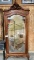 LARGE ANTIQUE ARMOIRE WITH BEVELED MIRROR