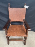 ANTIQUE HAND CARVED WOODEN LEATHER STUDDED CHAIR