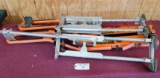 PAIR OF WORK STILTS AND LADDER RAIL EXTENSION SYSTEM
