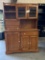 ANTIQUE OAK KITCHEN CABINET WITH PORCELAIN KNOBS