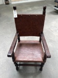 ANTIQUE LEATHER ARM CHAIR