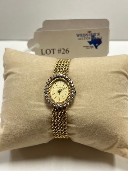 14KT YELLOW GOLD GENEVE WATCH WITH DIAMOND BEZEL  AND 14KT GOLD BAND