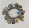 STERLING SILVER CHARM BRACELET W/ 25+CHARMS