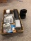 Office supplies, calculator, hole punch and post it