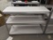 Metal three shelf storage rack