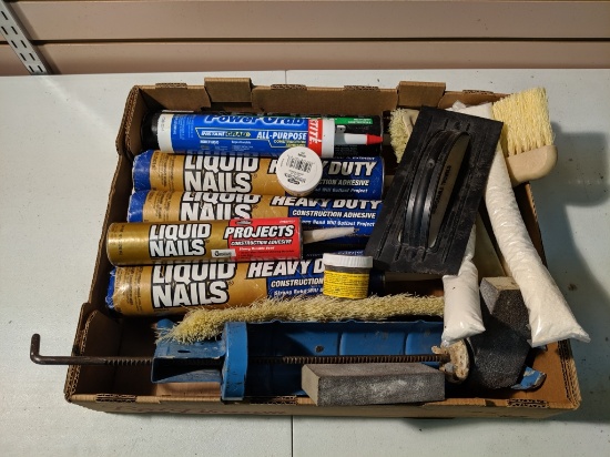 Liquid nail, caulk gun, wood putty, and brushes