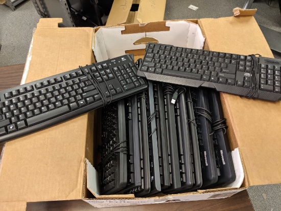Assorted box of computer keyboards