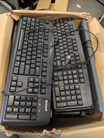 Large box of assorted computer keyboards mostly USB