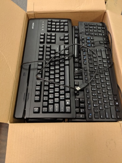 Smaller box of assorted computer keyboards