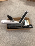 Hole punches and staplers