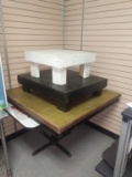 Three wooden stands and table