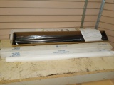 New roll of one way mirror film and partial t tablecloth cover