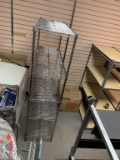 5 shelf metal rack. Metal rack. Approximately 6 feet tall.