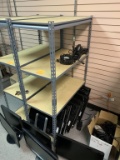 Metal rack with shelves Approximately 5 feet tall. Rack only.