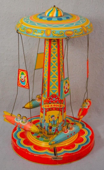 J. Chein Wind Up "ride A Rocket" Tin Toy