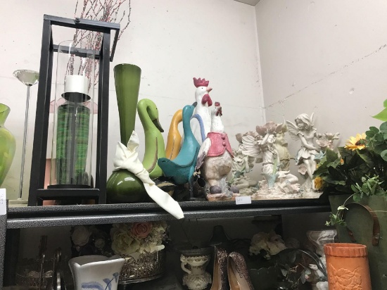 Shelf of figural decorations and vases
