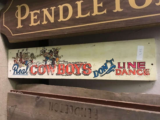 Hand drawn and colored sign by Cal Polk cartooning big Tom copyright 85