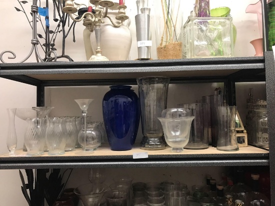 Shelf of decorative vases and or candleholders