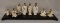 8 Chinese Figures on Wood Stand. Glazed White Robes. Modern. Largest is 5