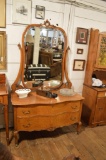 Golden Oak Serpentine Front Dresser With Beveled Mirror