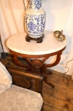 1920 Walnut Oval Marble Top Table on Casters