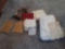 Assorted hot plates, cotton napkins, and (1) sheet