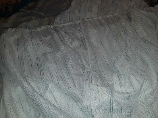 Curtains and box of misc. fabric