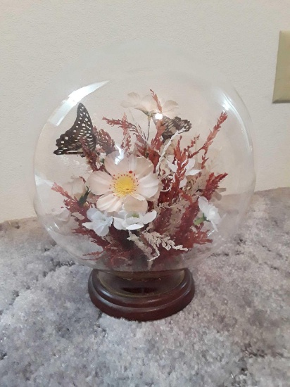 Decorative glass bowl with fake flower display inside and wooden jewlery box