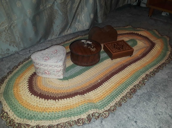 (3) wooden jewlery boxes and (1) floral print heart shaped jerwlery box and (1) macrame rug