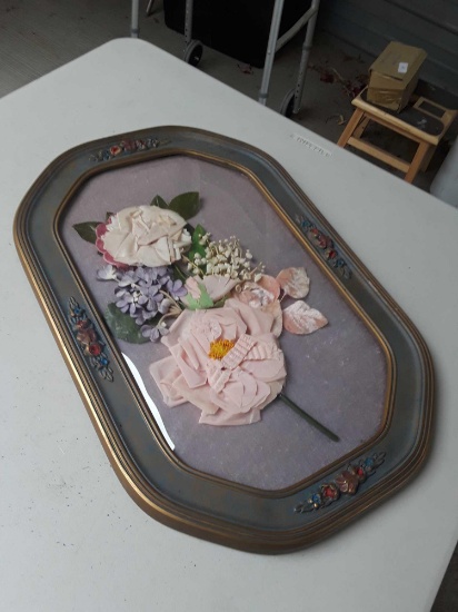 Framed art with fake flowers inside