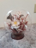 Decorative glass bowl with fake flower display inside and wooden jewlery box