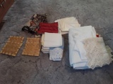 Assorted hot plates, cotton napkins, and (1) sheet
