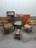 (4) assorted wooden fold up chairs (1) wooden stool (1) tv tray