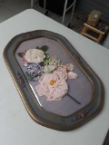 Framed art with fake flowers inside