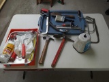 Assorted hand tools and painting supplies