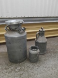 (1) cream can (2) milk canasters