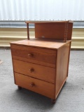 3 drawer night stand with contents