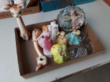 (7) decorative figurines (1) wind chimes (1) decorative plate