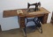 Antique Singer Treadle Sewing Machine w/ No. 66-1 Manual, In Oak cabinet.