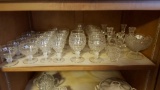 Shelf of Assorted Glassware.