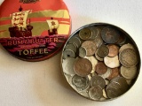 Tin of assorted foreign coins