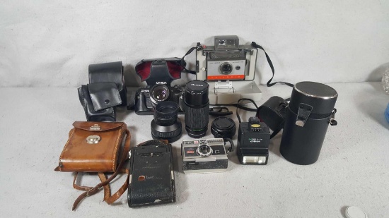 Lot of (7) (4) Cameras and (3) Accessories